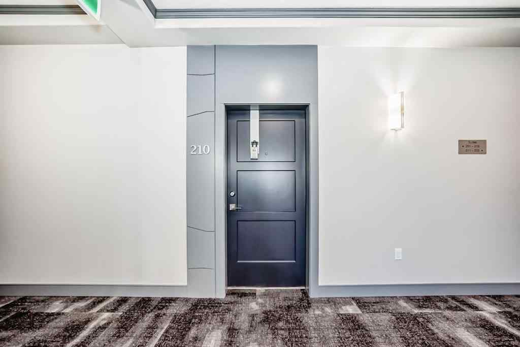 MLS® A2252857 - Unit #210 8355 19 Avenue SW in Springbank Hill Calgary, Residential