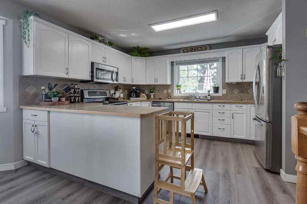 MLS® A2252895 - 67 Duston Street  in Deer Park Estates Red Deer, Residential