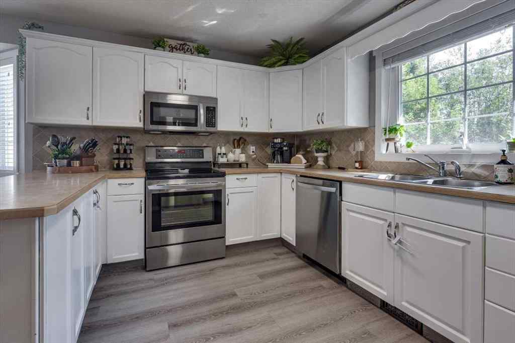 MLS® A2252895 - 67 Duston Street  in Deer Park Estates Red Deer, Residential