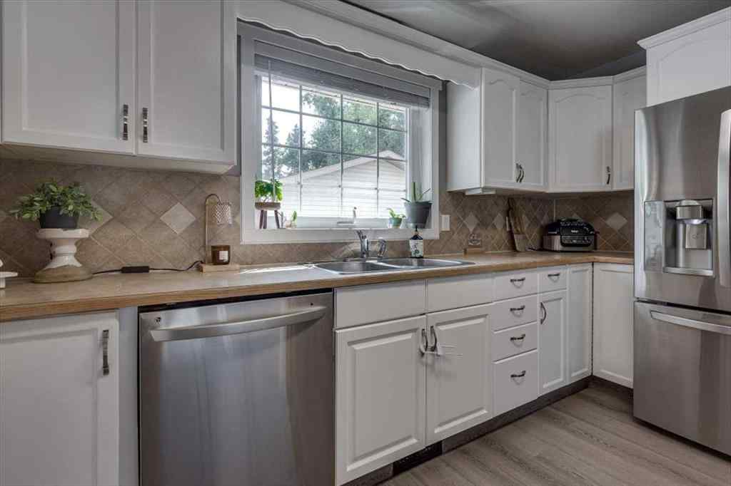 MLS® A2252895 - 67 Duston Street  in Deer Park Estates Red Deer, Residential