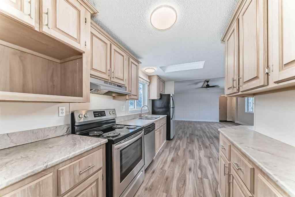 MLS® A2252897 - 203 Burroughs Circle NE in Monterey Park Calgary, Mobile