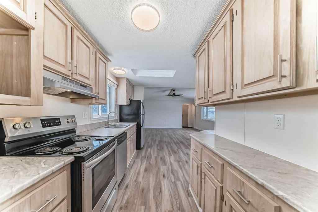 MLS® A2252897 - 203 Burroughs Circle NE in Monterey Park Calgary, Mobile