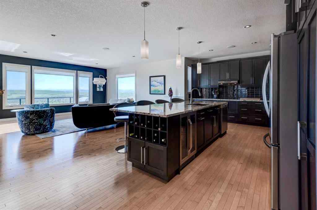 MLS® A2252909 - 220 Springbluff Heights SW in Springbank Hill Calgary, Residential