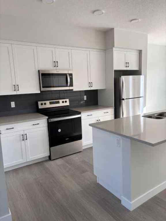 MLS® A2252944 - 619 Savanna Crescent NE in Saddle Ridge Calgary, Residential