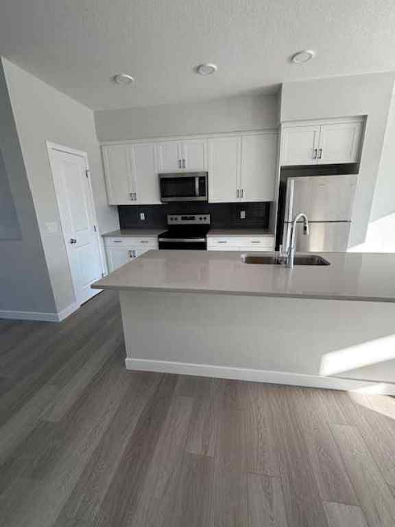 MLS® A2252944 - 619 Savanna Crescent NE in Saddle Ridge Calgary, Residential