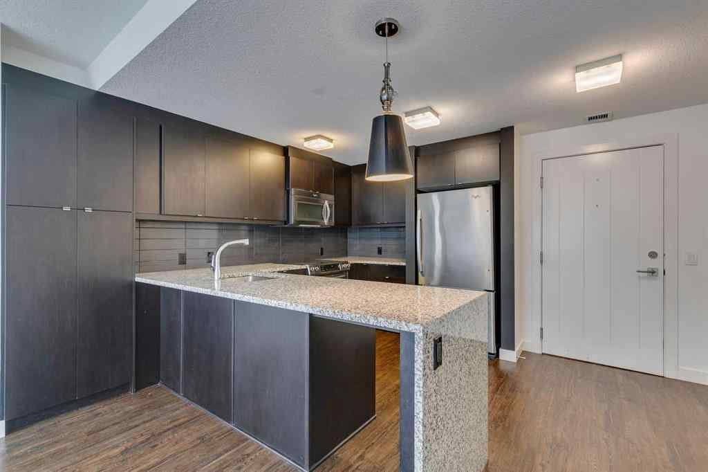 MLS® A2252950 - Unit #107 25 Aspenmont Heights SW in Aspen Woods Calgary, Residential