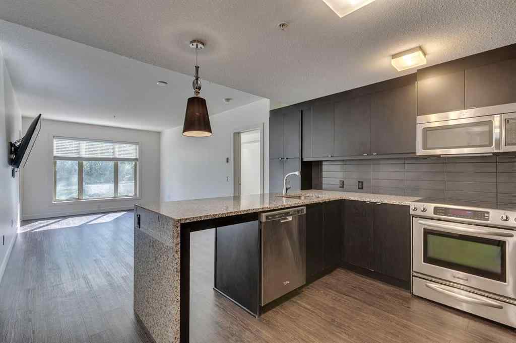 MLS® A2252950 - Unit #107 25 Aspenmont Heights SW in Aspen Woods Calgary, Residential