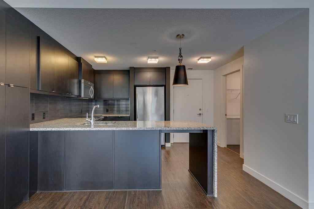 MLS® A2252950 - Unit #107 25 Aspenmont Heights SW in Aspen Woods Calgary, Residential