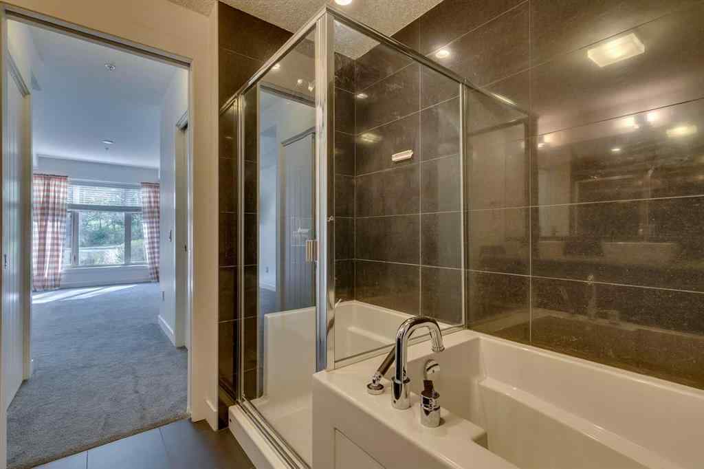 MLS® A2252950 - Unit #107 25 Aspenmont Heights SW in Aspen Woods Calgary, Residential