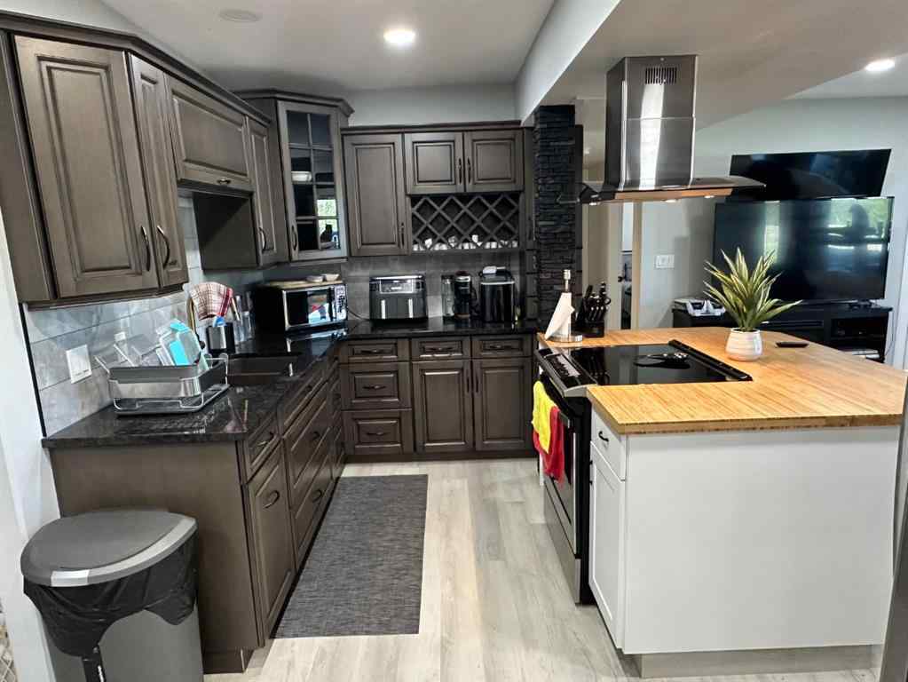 MLS® A2252988 - 7702 Devonshire Lane  in Carriage Lane Estates Rural Grande Prairie No. 1, County of, Residential