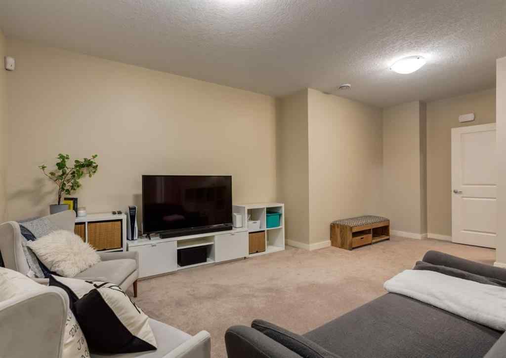 MLS® A2252995 - 85 Mike Ralph Way SW in Garrison Green Calgary, Residential