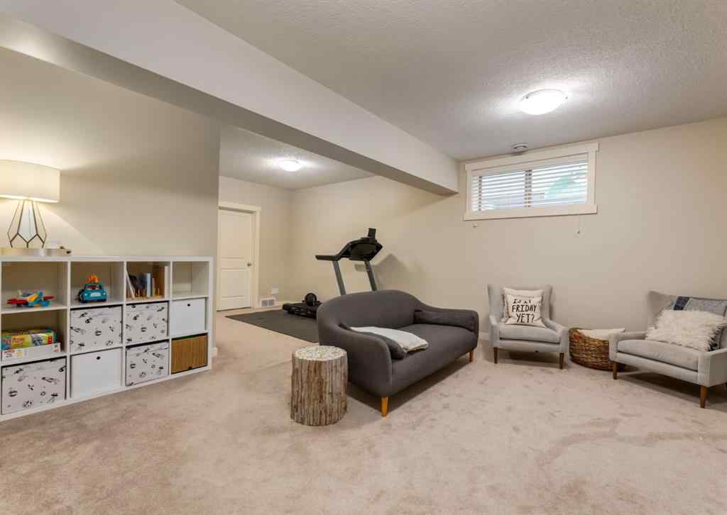 MLS® A2252995 - 85 Mike Ralph Way SW in Garrison Green Calgary, Residential