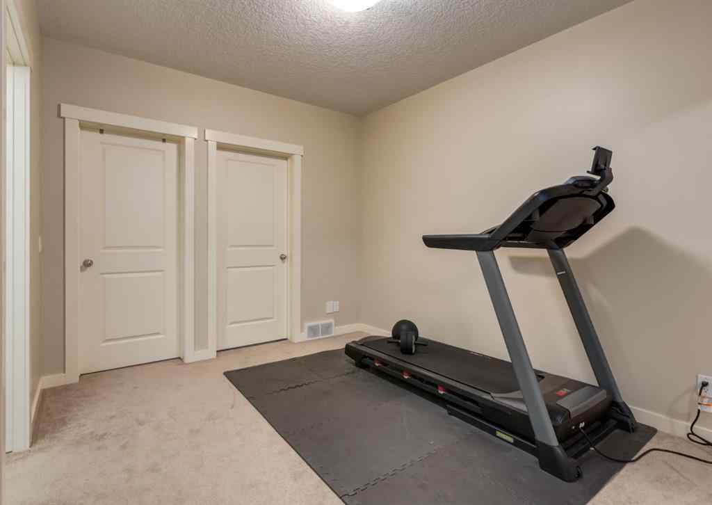 MLS® A2252995 - 85 Mike Ralph Way SW in Garrison Green Calgary, Residential