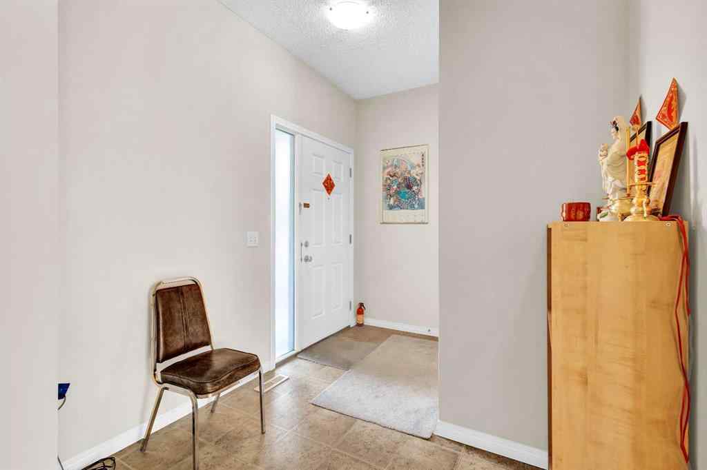 MLS® A2253000 - 156 Saddlecrest Park NE in Saddle Ridge Calgary, Residential