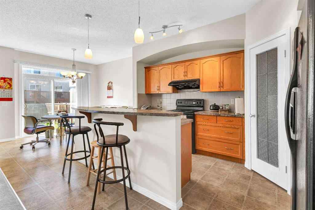 MLS® A2253000 - 156 Saddlecrest Park NE in Saddle Ridge Calgary, Residential