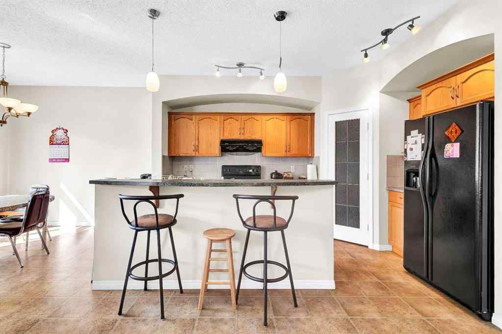 MLS® A2253000 - 156 Saddlecrest Park NE in Saddle Ridge Calgary, Residential