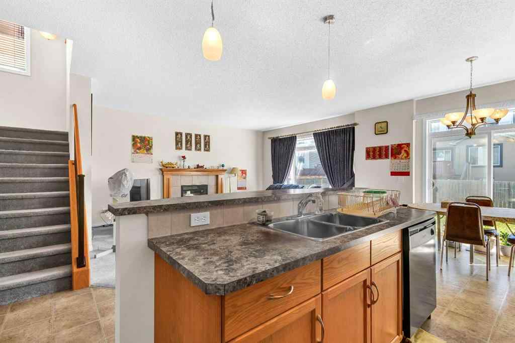MLS® A2253000 - 156 Saddlecrest Park NE in Saddle Ridge Calgary, Residential