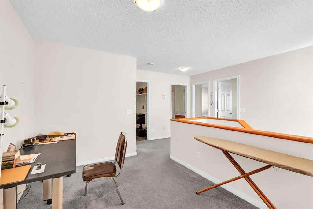 MLS® A2253000 - 156 Saddlecrest Park NE in Saddle Ridge Calgary, Residential