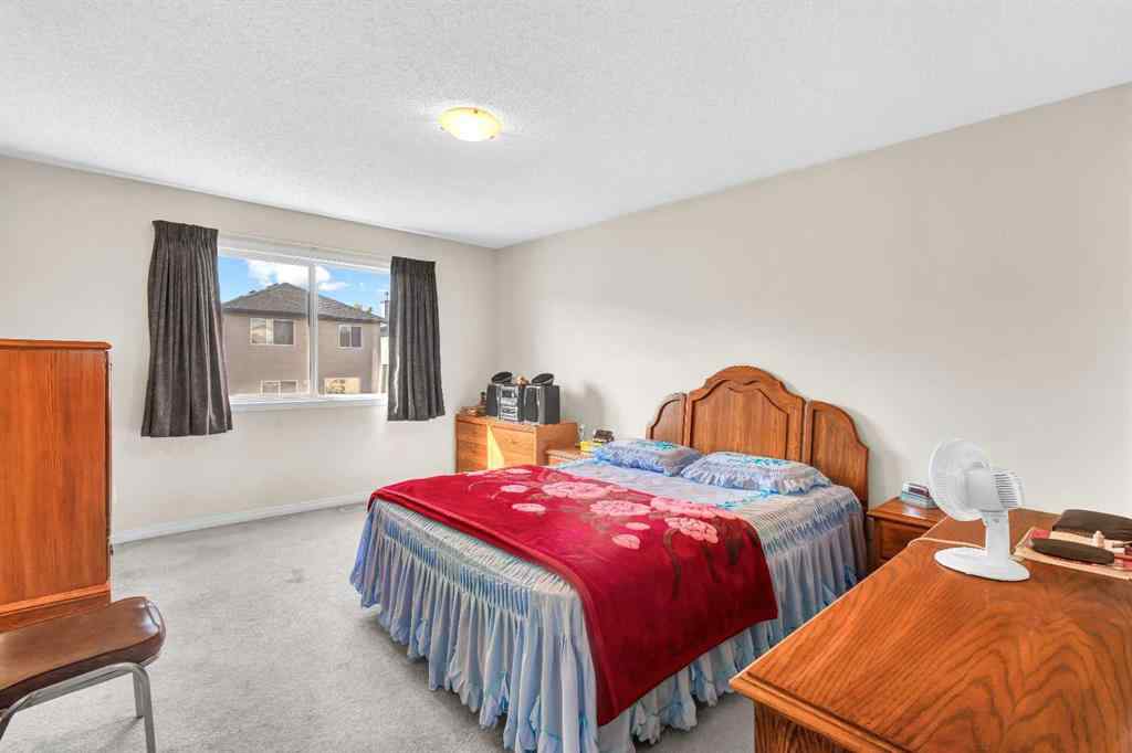 MLS® A2253000 - 156 Saddlecrest Park NE in Saddle Ridge Calgary, Residential