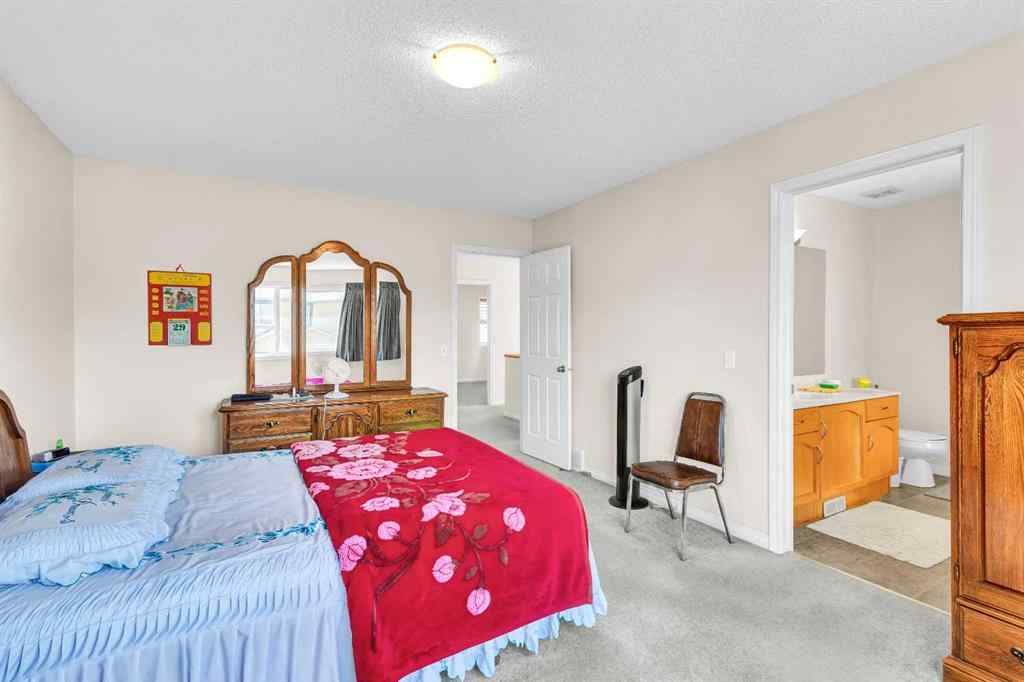 MLS® A2253000 - 156 Saddlecrest Park NE in Saddle Ridge Calgary, Residential