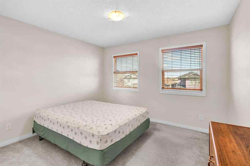 MLS® A2253000 - 156 Saddlecrest Park NE in Saddle Ridge Calgary, Residential