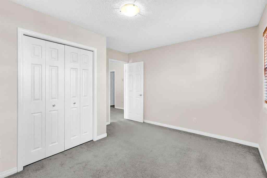 MLS® A2253000 - 156 Saddlecrest Park NE in Saddle Ridge Calgary, Residential