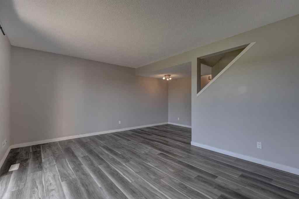 MLS® A2253034 - Unit #402 700 Allen Street SE in Airdrie Meadows Airdrie, Residential