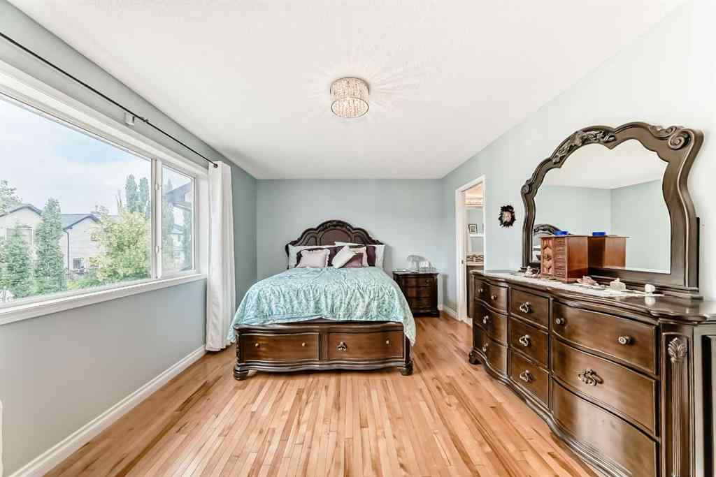 MLS® A2253052 - 54 Cougarstone Mews SW in Cougar Ridge Calgary, Residential