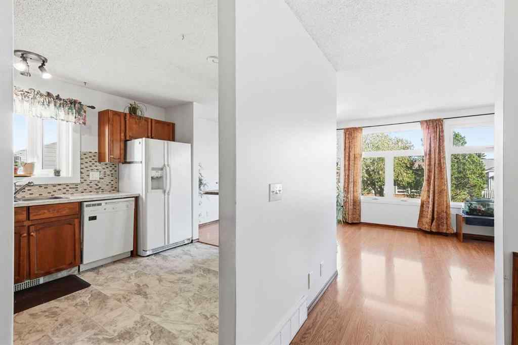 MLS® A2253056 - 43 Macewan Glen Road NW in MacEwan Glen Calgary, Residential