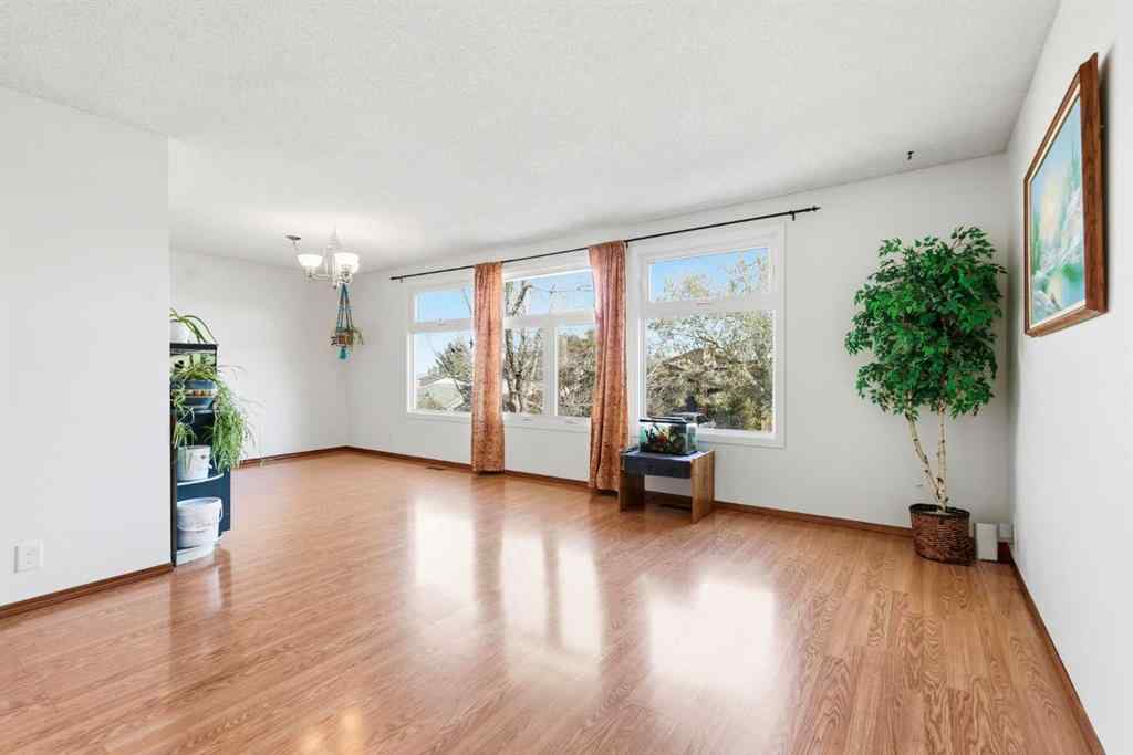 MLS® A2253056 - 43 Macewan Glen Road NW in MacEwan Glen Calgary, Residential