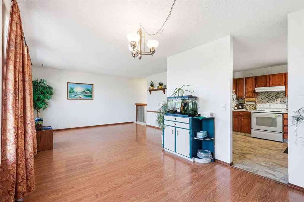 MLS® A2253056 - 43 Macewan Glen Road NW in MacEwan Glen Calgary, Residential