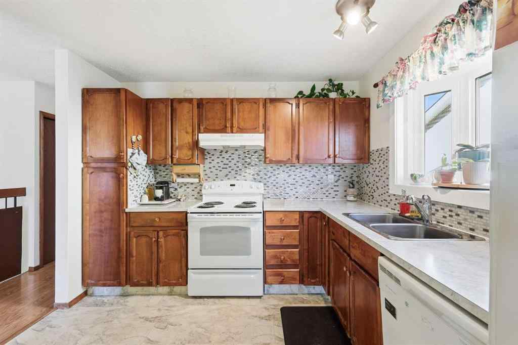 MLS® A2253056 - 43 Macewan Glen Road NW in MacEwan Glen Calgary, Residential