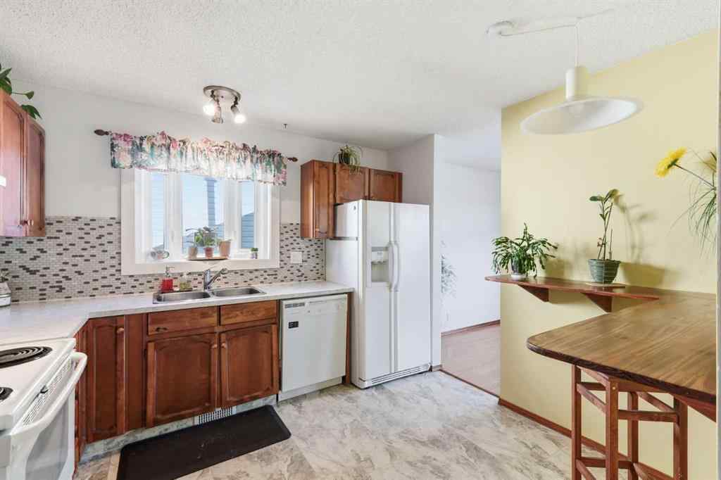 MLS® A2253056 - 43 Macewan Glen Road NW in MacEwan Glen Calgary, Residential