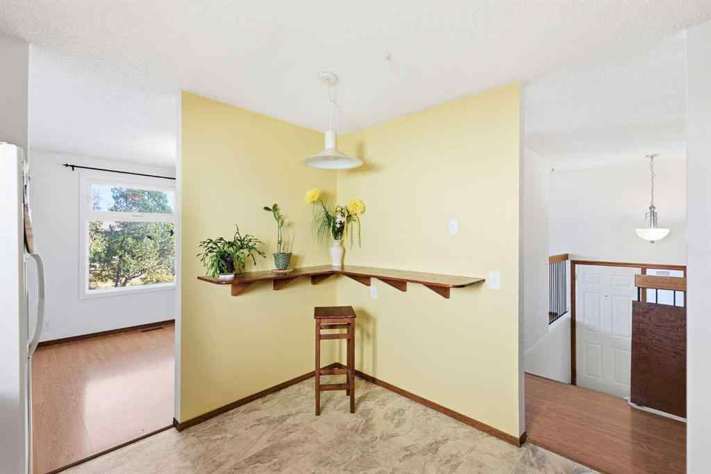 MLS® A2253056 - 43 Macewan Glen Road NW in MacEwan Glen Calgary, Residential