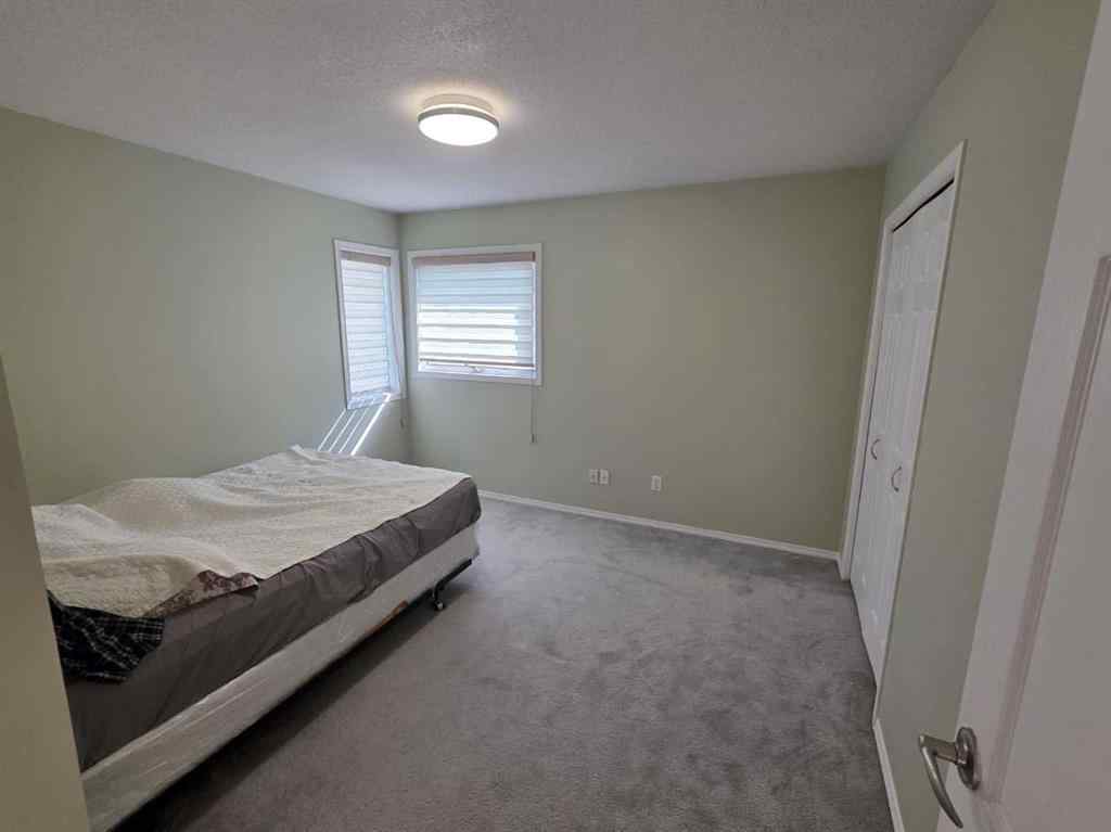 MLS® A2253074 - 10722 91 Street  in Lower West Peace Peace River, Residential