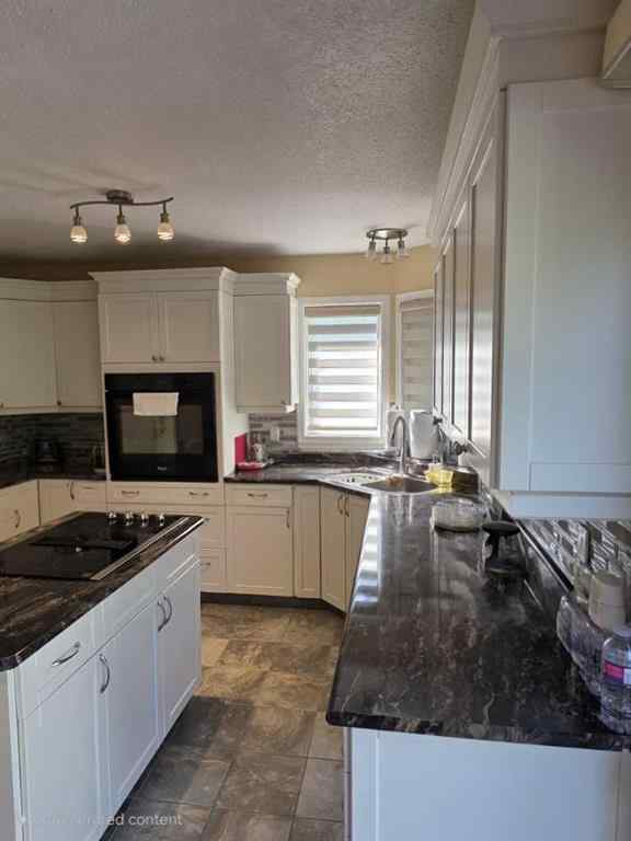 MLS® A2253074 - 10722 91 Street  in Lower West Peace Peace River, Residential