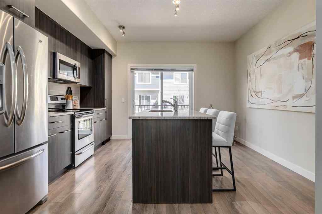 MLS® A2253087 - Unit #165 2802 Kings Heights Gate SE in Ravenswood Airdrie, Residential