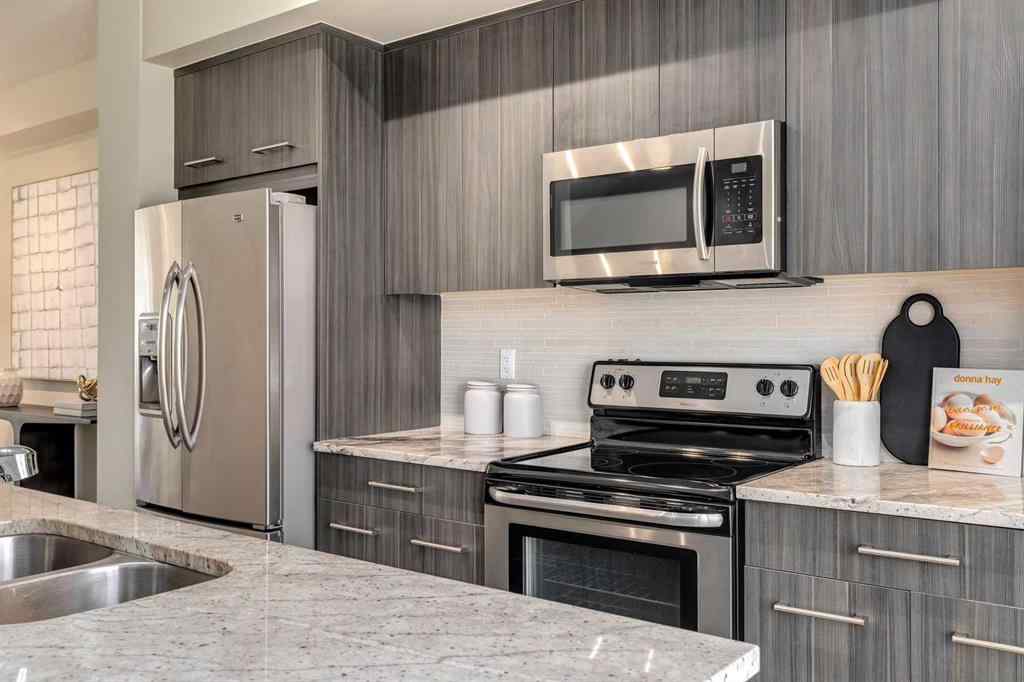 MLS® A2253087 - Unit #165 2802 Kings Heights Gate SE in Ravenswood Airdrie, Residential