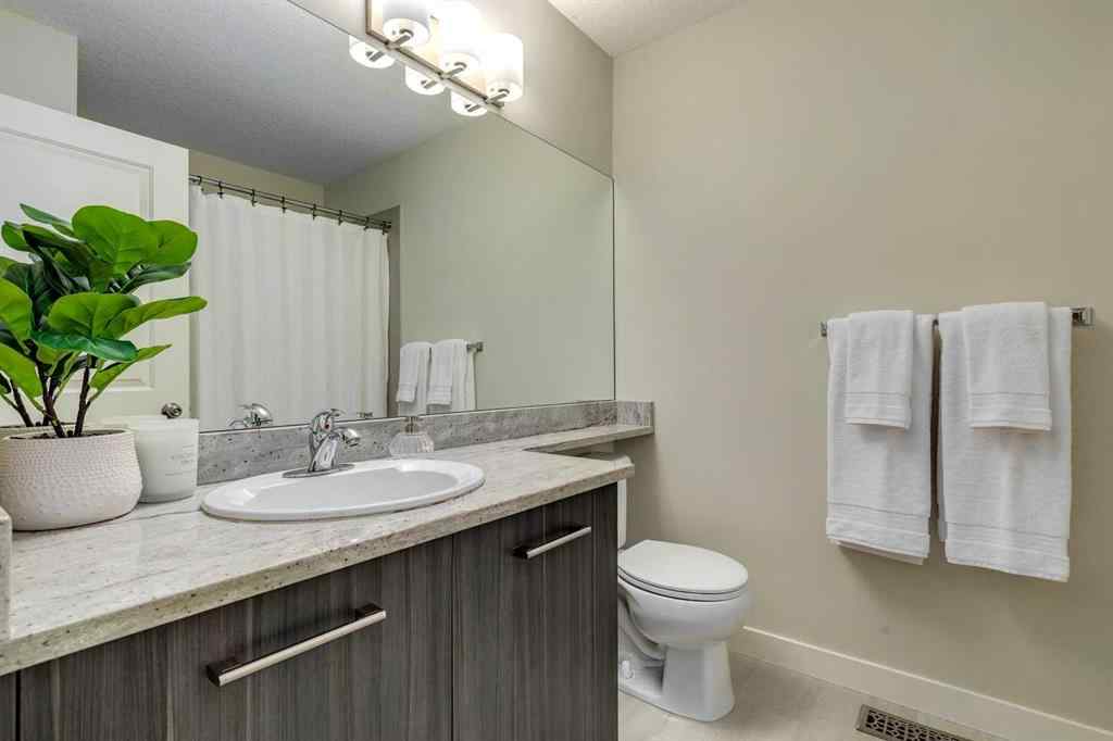 MLS® A2253087 - Unit #165 2802 Kings Heights Gate SE in Ravenswood Airdrie, Residential