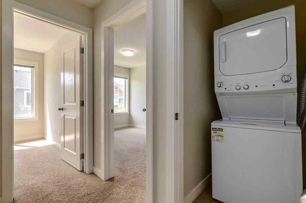 MLS® A2253087 - Unit #165 2802 Kings Heights Gate SE in Ravenswood Airdrie, Residential