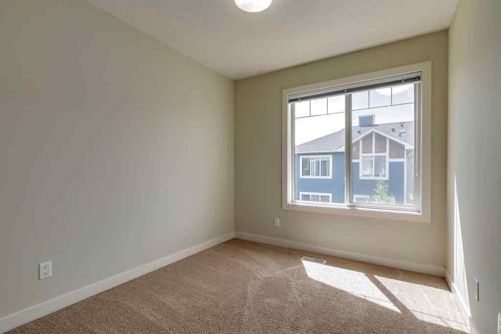 MLS® A2253087 - Unit #165 2802 Kings Heights Gate SE in Ravenswood Airdrie, Residential