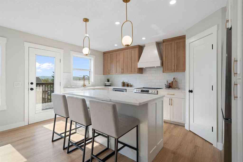MLS® A2253098 - 335 Hidden Creek Boulevard NW in Hidden Valley Calgary, Residential