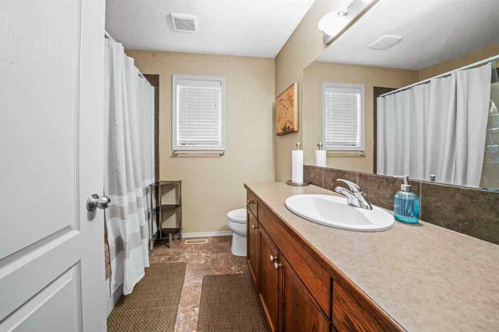 MLS® A2253108 - 5610 Prairie Ridge Avenue  in Panorama Estates Blackfalds, Residential