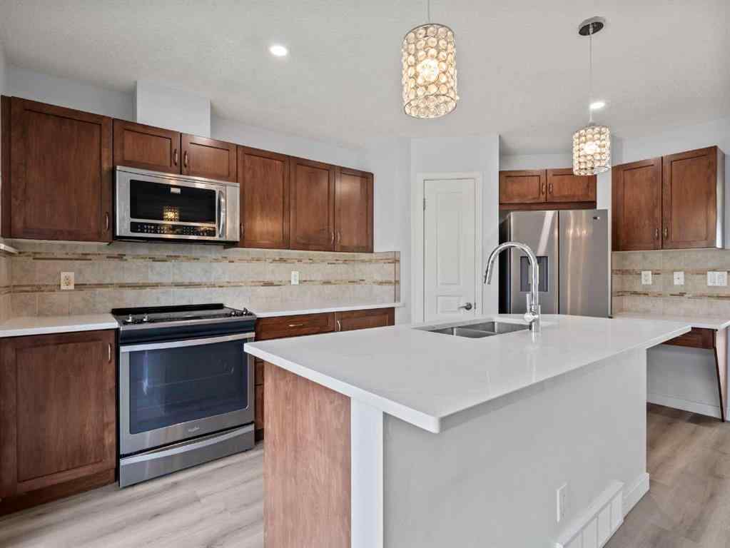 MLS® A2253111 - 1322 New Brighton Park SE in New Brighton Calgary, Residential