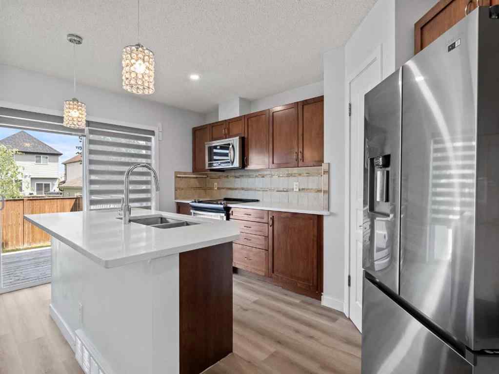 MLS® A2253111 - 1322 New Brighton Park SE in New Brighton Calgary, Residential