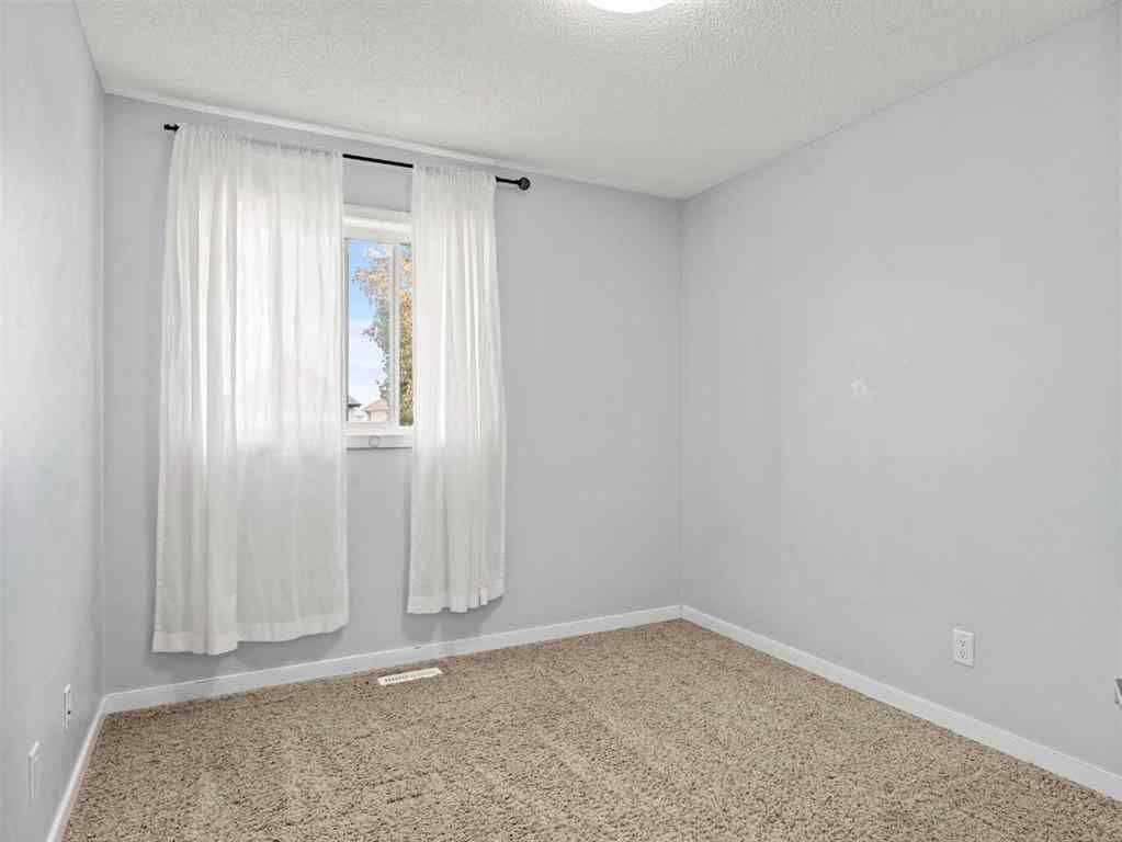 MLS® A2253111 - 1322 New Brighton Park SE in New Brighton Calgary, Residential