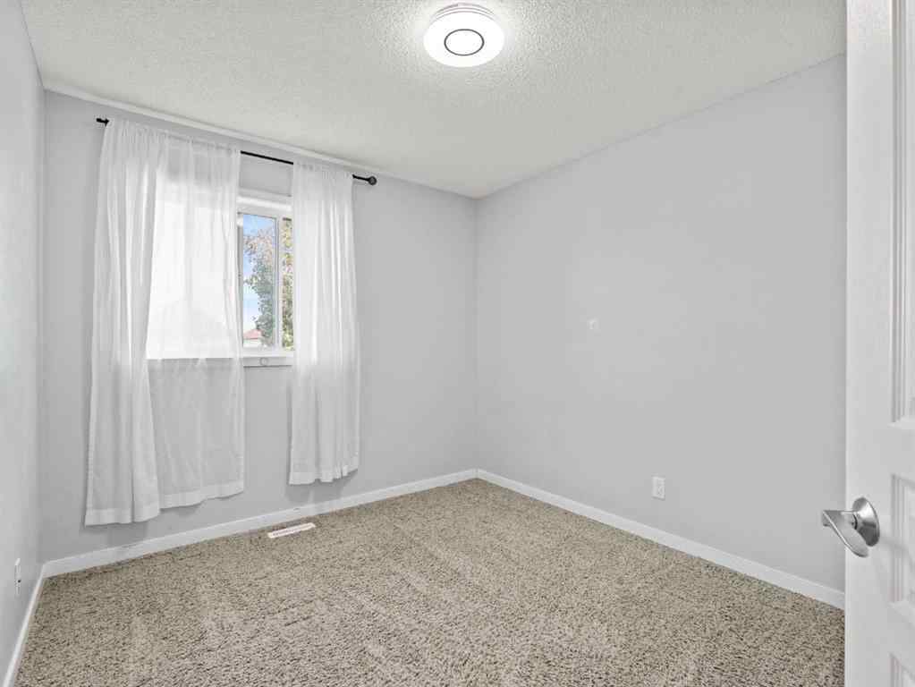 MLS® A2253111 - 1322 New Brighton Park SE in New Brighton Calgary, Residential