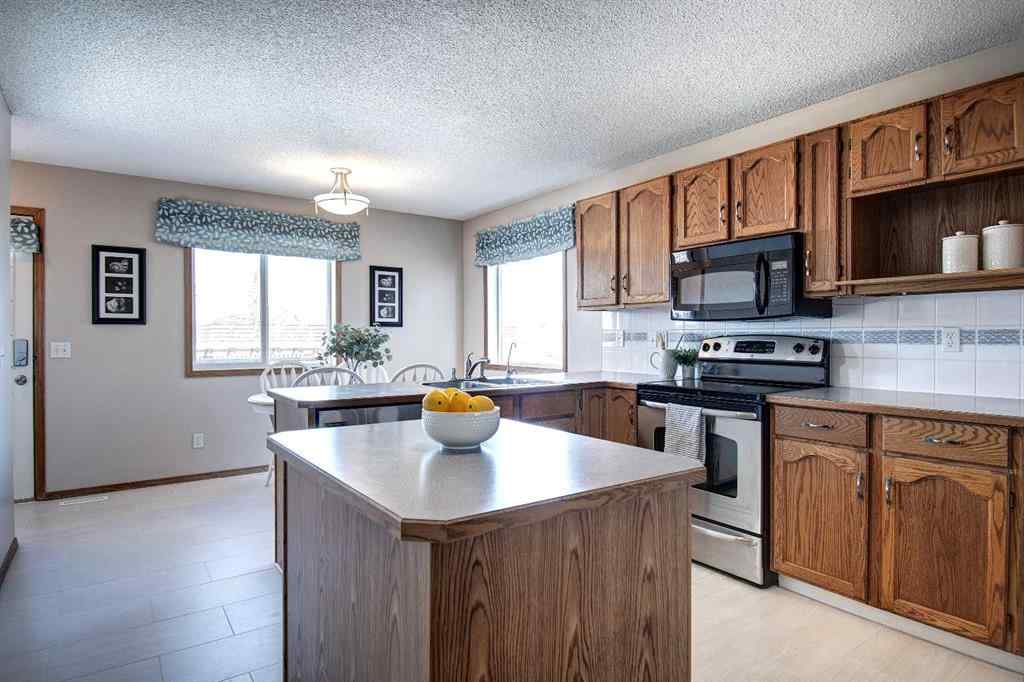 MLS® A2253114 - 8 Canoe Circle SW in Canals Airdrie, Residential