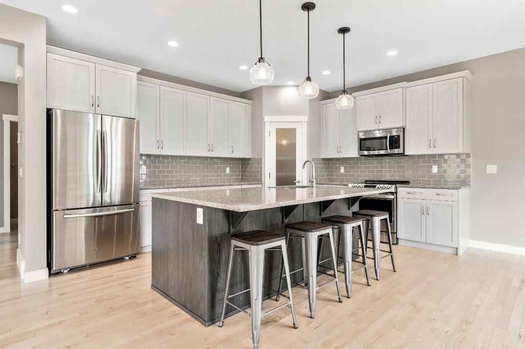MLS® A2253125 - 21 Riviera Bay  in Riviera Cochrane, Residential