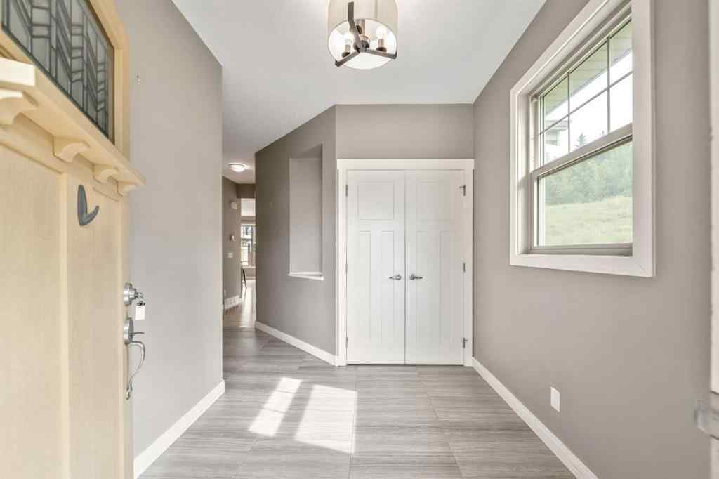 MLS® A2253125 - 21 Riviera Bay  in Riviera Cochrane, Residential